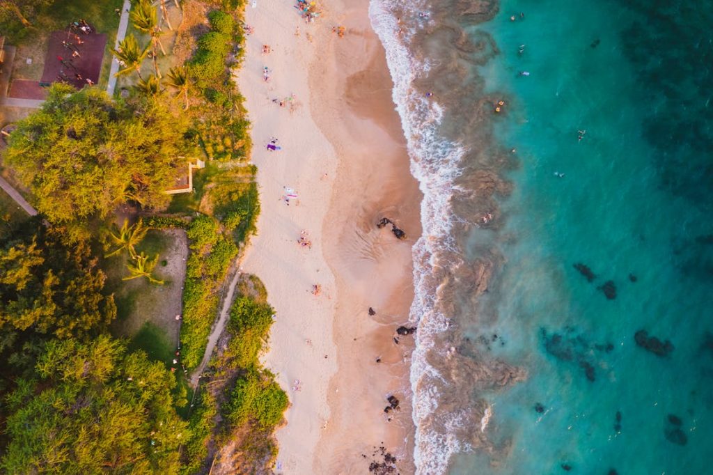Aerial view of Maui's west side beaches showing clear shallow water and golden sand, best Maui beaches 2026
