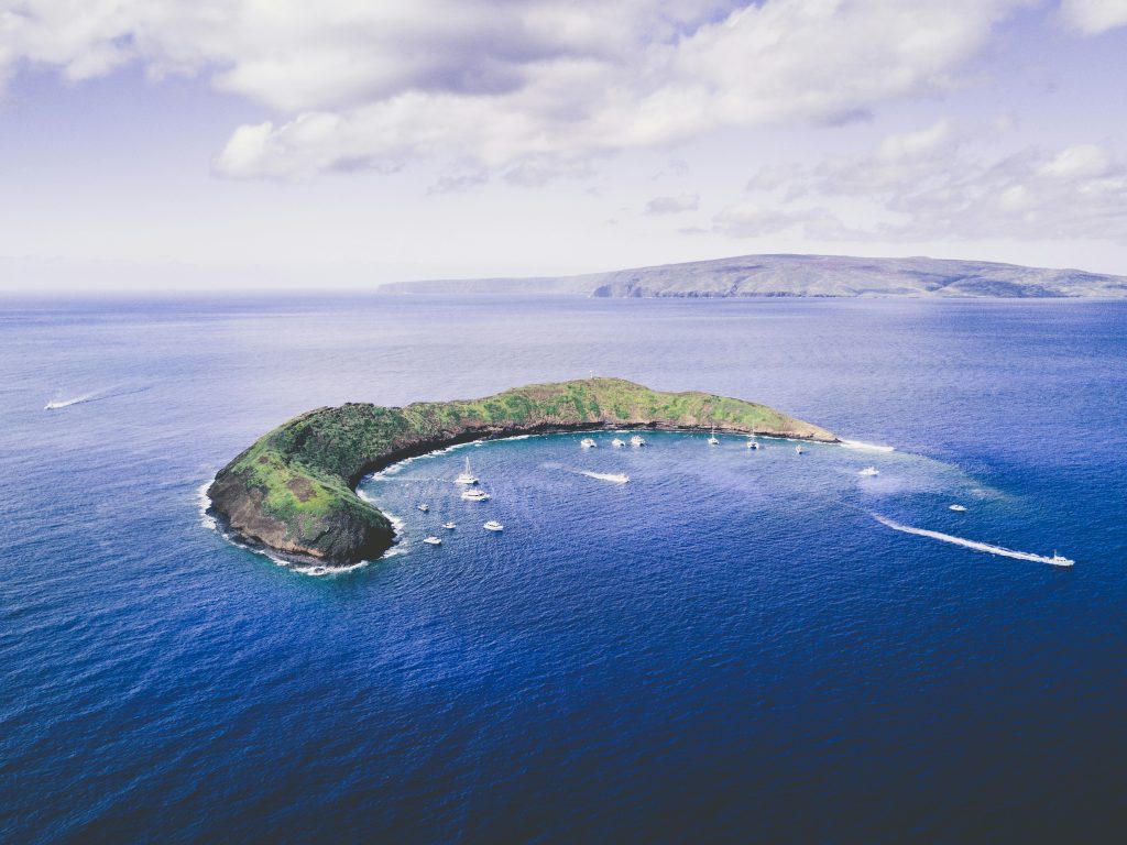 Aerial view of Molokini Crater volcanic crescent off the coast of Maui, Hawaii
