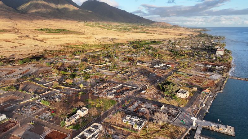 Aerial view of West Maui coastline and Lahaina town in 2026 showing ocean, mountains, and surrounding recovery area