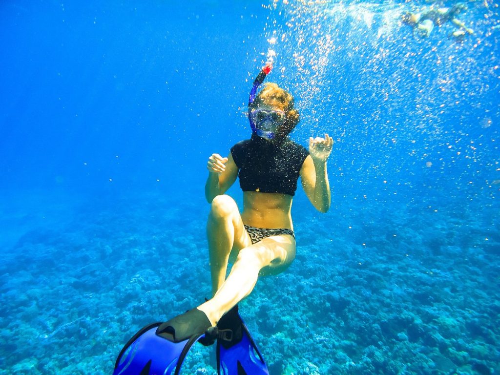 Snorkeling with sea turtles at Turtle Town Maui