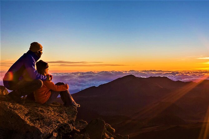 Sunrise above the clouds at Haleakalā summit Maui — romantic honeymoon activity 2026